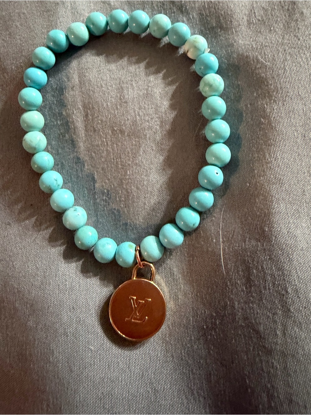 Hand Crafted Turquoise Beaded Bracelet with Gold Disc Charm